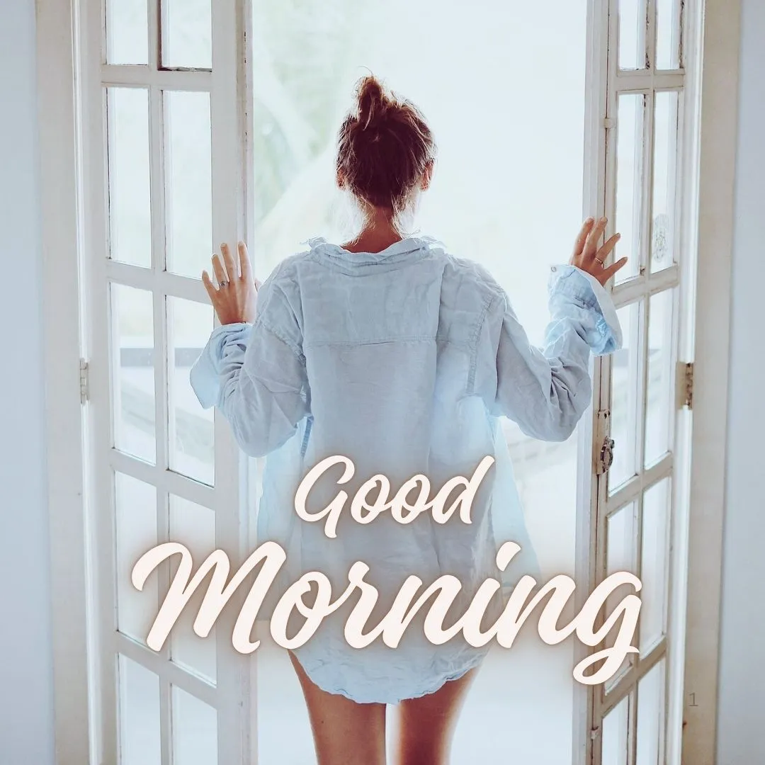 Morning Light Moment – Woman Greeting the Day with “Good Morning” Woman in light shirt standing in open doorway with soft morning light and “Good Morning” text
