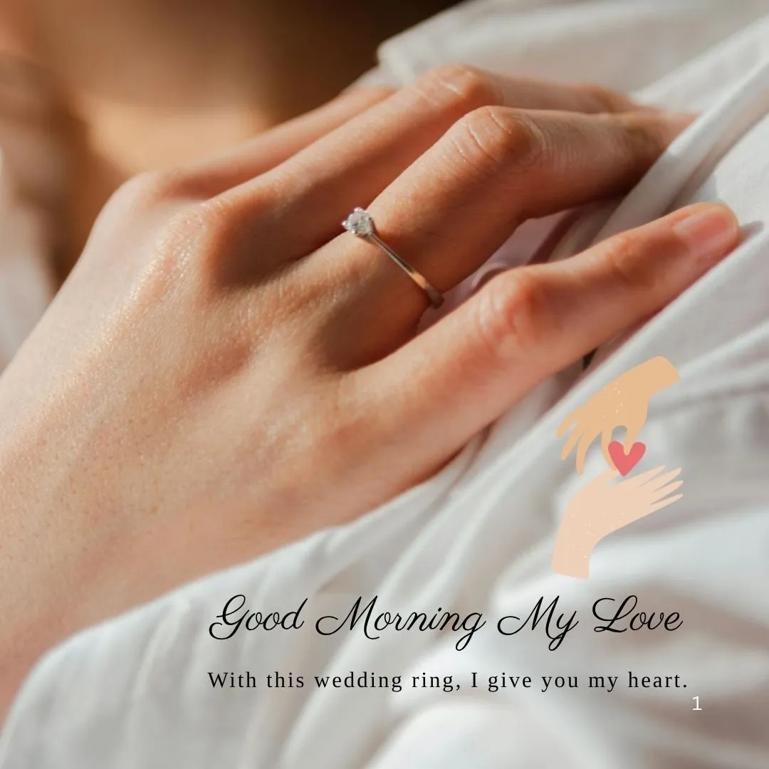 Wedding Ring Good Morning Image for Husband – Romantic Touch of Love Woman’s hand wearing a ring placed on man’s shoulder with romantic good morning message “With this ring, I give you my heart